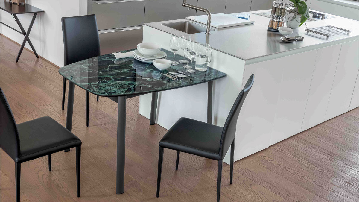 Modern kitchen with the Paddington  table and black chairs.
