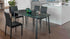 Paddington dining table with green marble top and black chairs in a kitchen setting