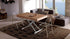 Newood raising coffee to dining table 